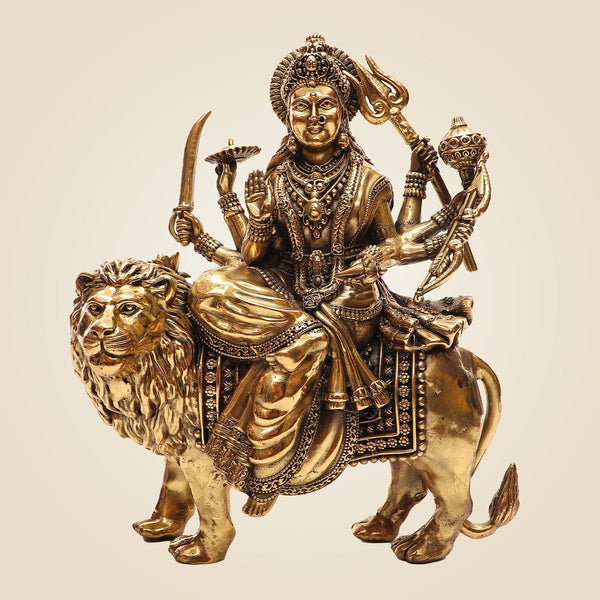 Brass Goddess Durga Idol on Lion • Divine Multi-Armed Idol with Shakti Weapon – 9.25"